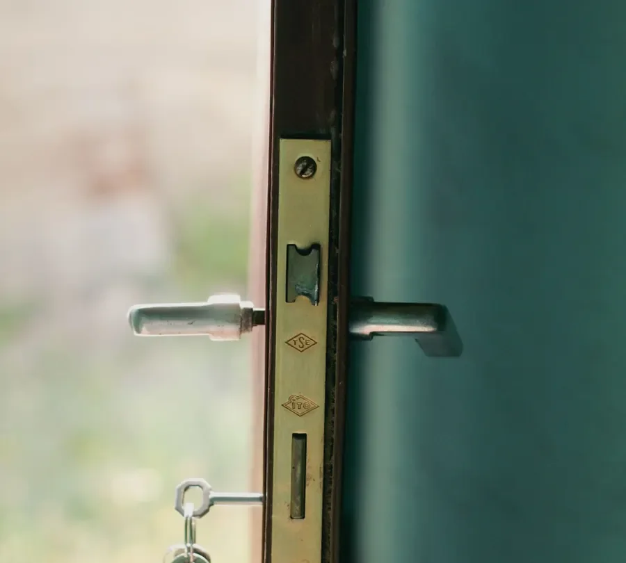 Open door showing the locking edge and handle – commercial locksmith Wilmslow advice on the right lock for a business entrance from Locksmith Wilmslow