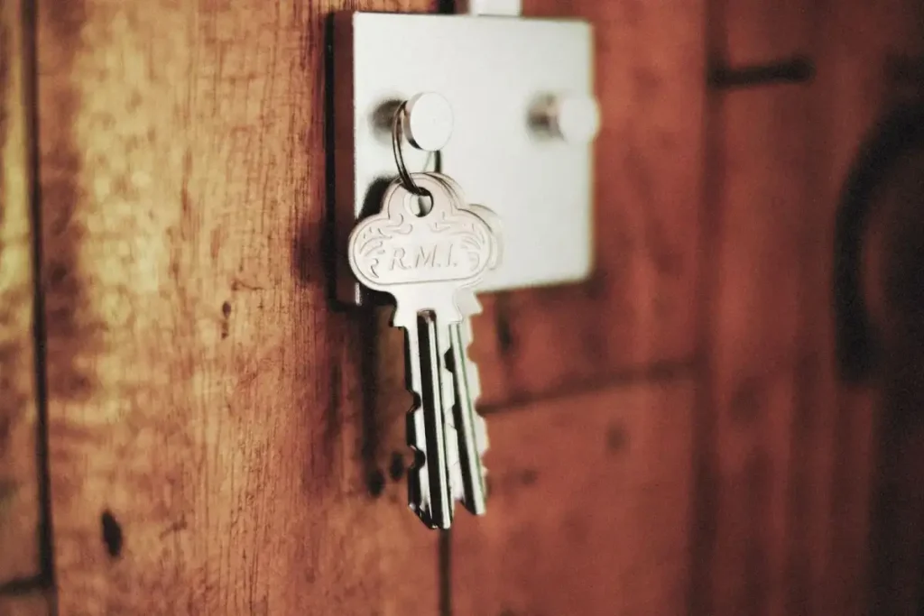 Key in the lock of a timber door – testing a new door lock after you replace it, how to replace a door lock in Wilmslow with Craven Locksmiths Wilmslow